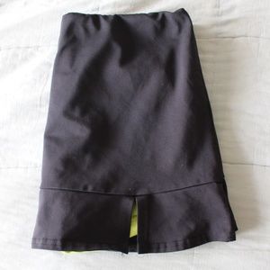 Black tennis skirt with lime green spandex